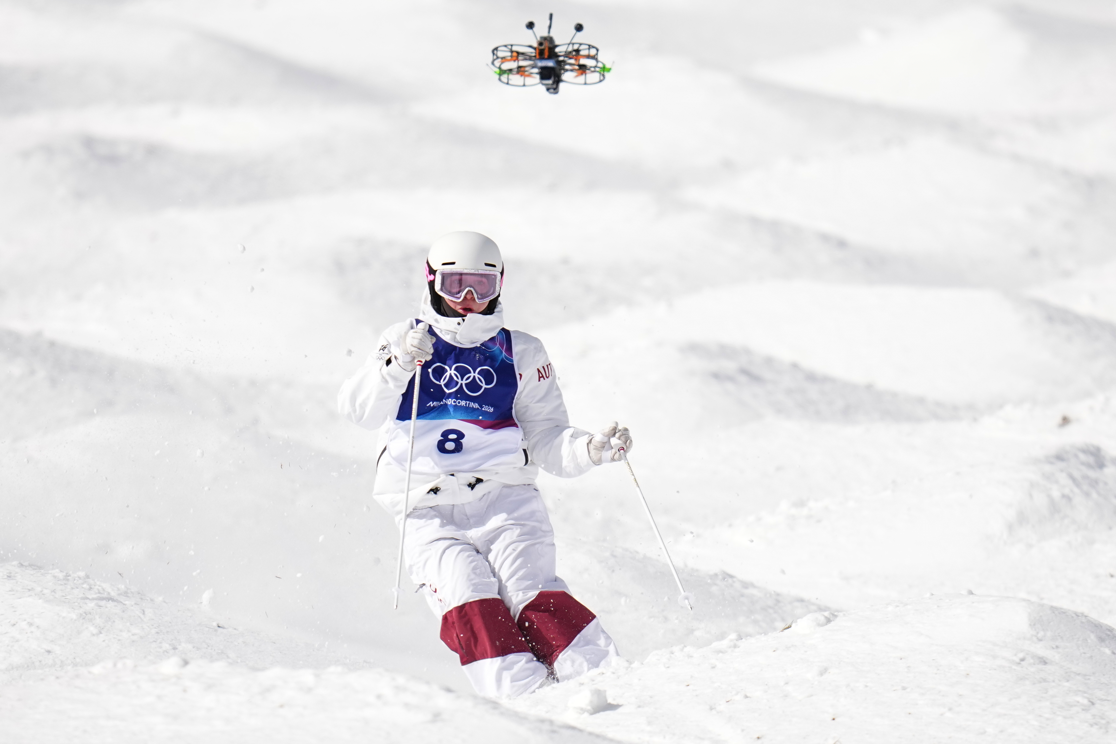 Remote-piloted drones chase Olympians at the Winter Games, in photos