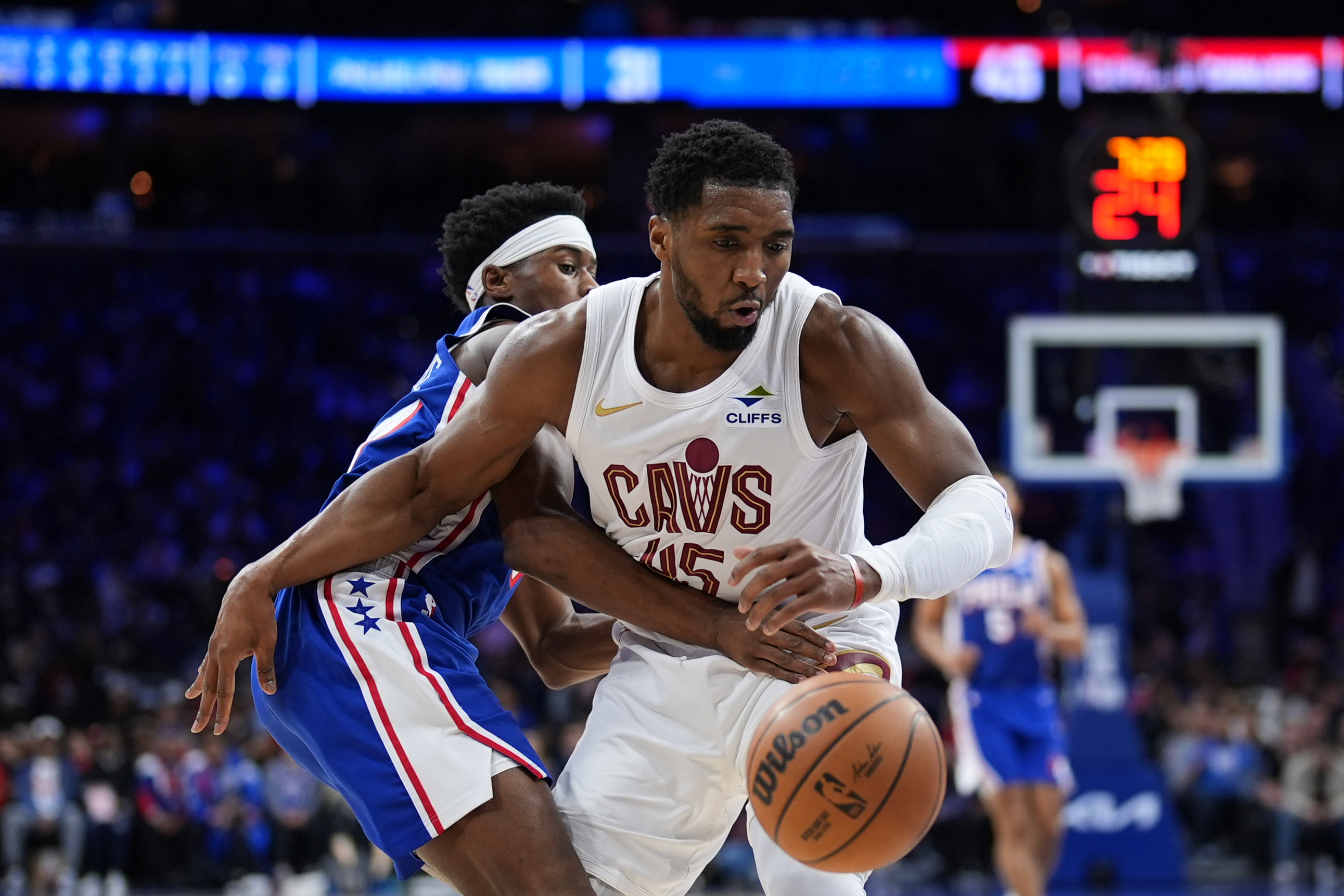 Donovan Mitchell has 35 points to power Cleveland Cavaliers past Philadelphia 76ers 133-107 but Darius Garland exits with foot injury