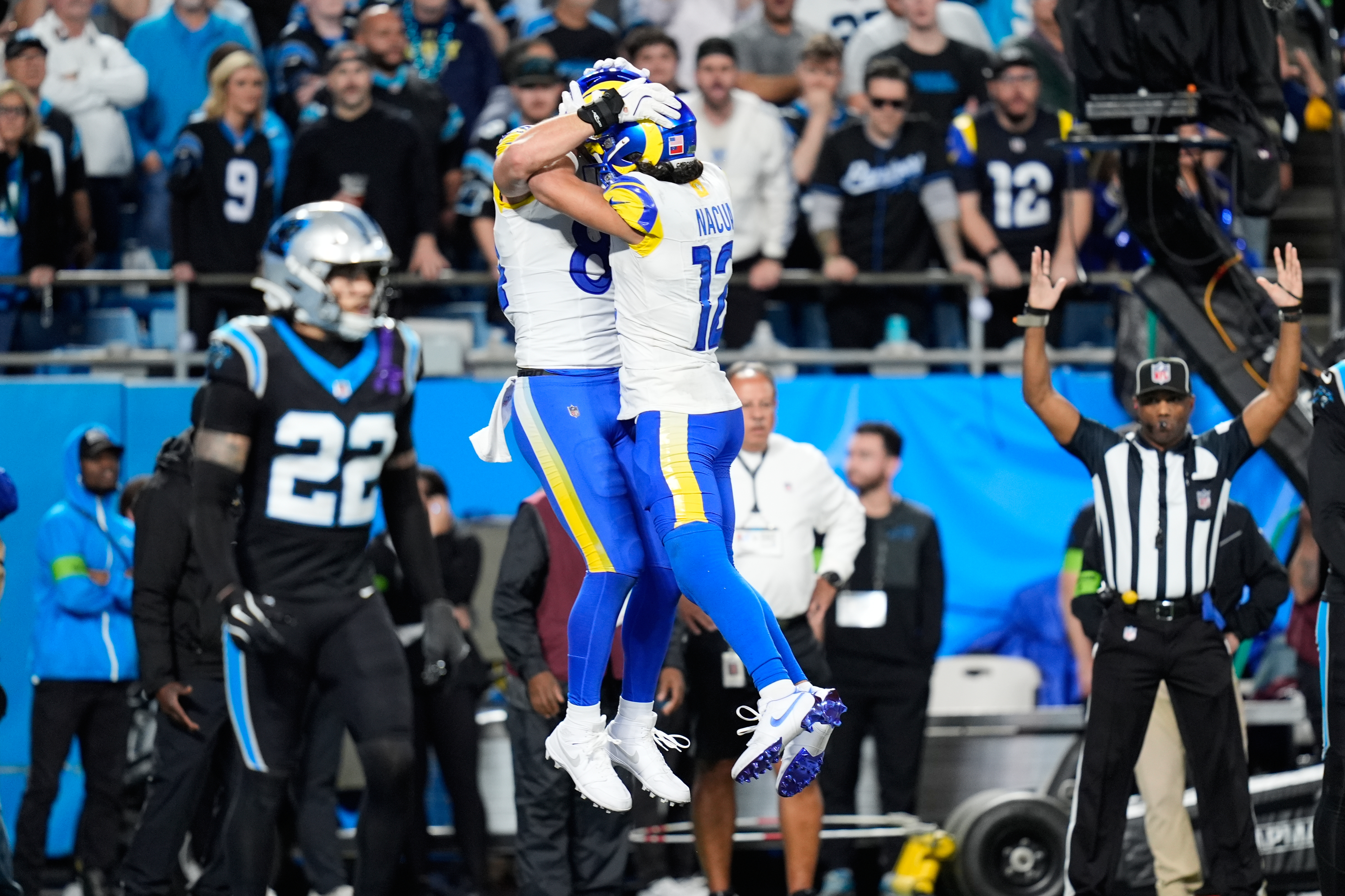 Stafford's late TD pass to Parkinson lifts the Rams past the Panthers 34-31 in the wild-card round