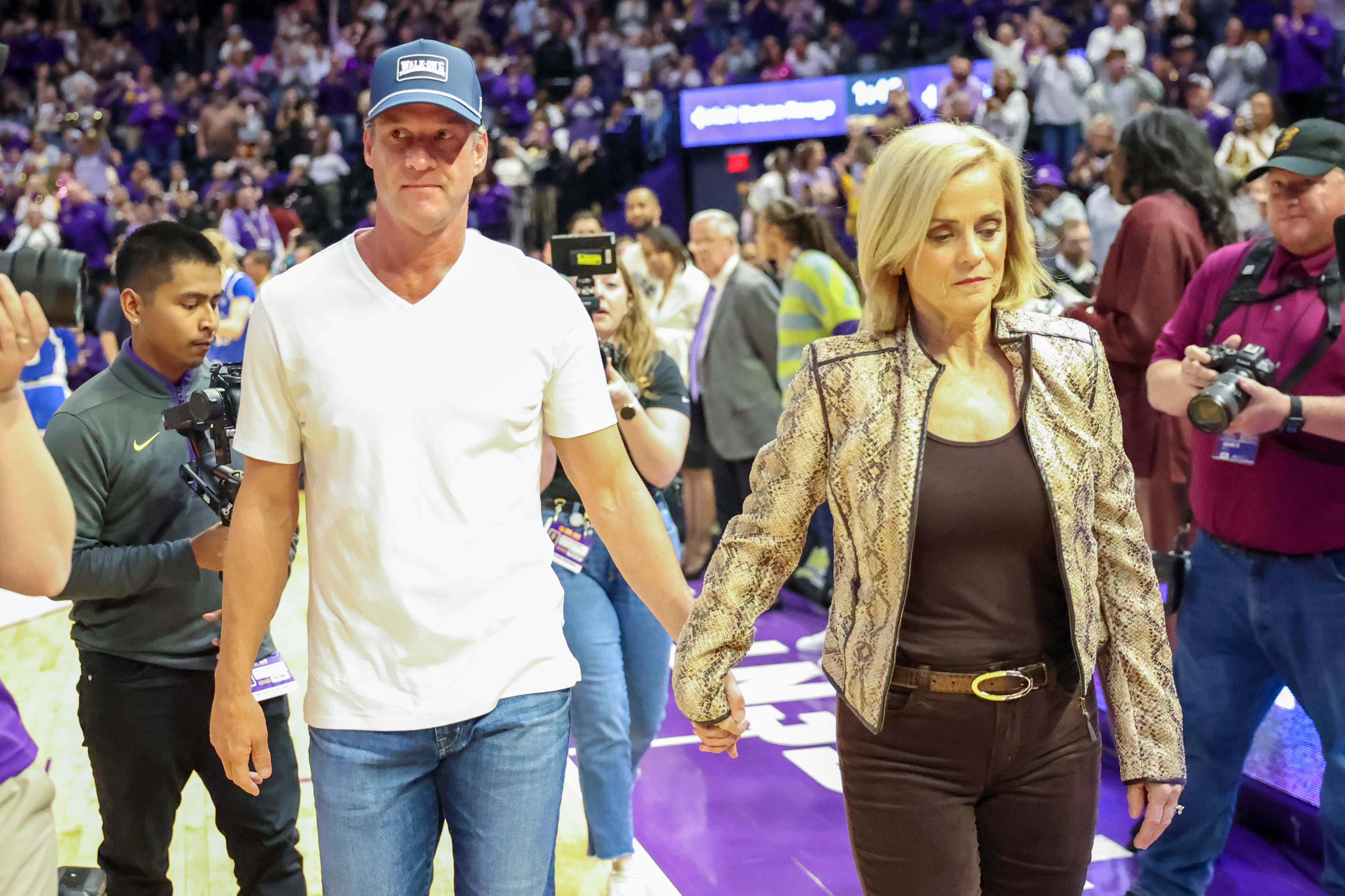 LSU football coach Kiffin attends Tigers' women's hoop game as Ole Miss faces Georgia at Sugar Bowl